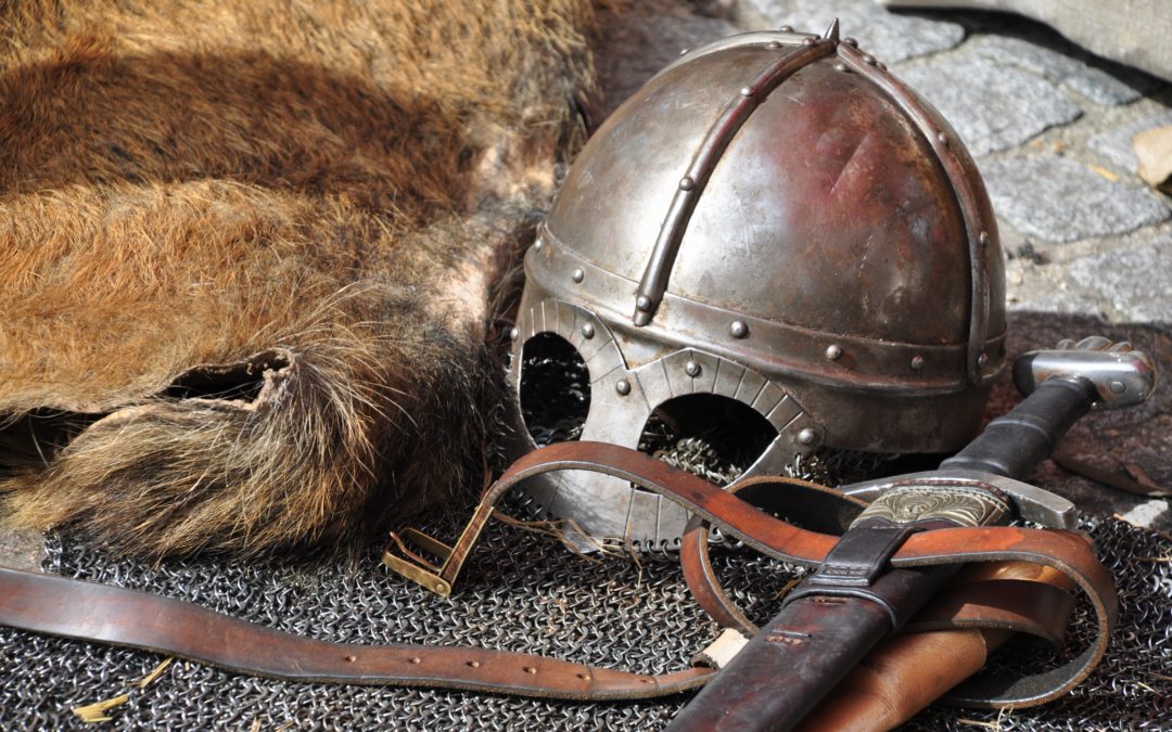 Visual representation of a brand guardian: medieval sword, helmet, and fur.